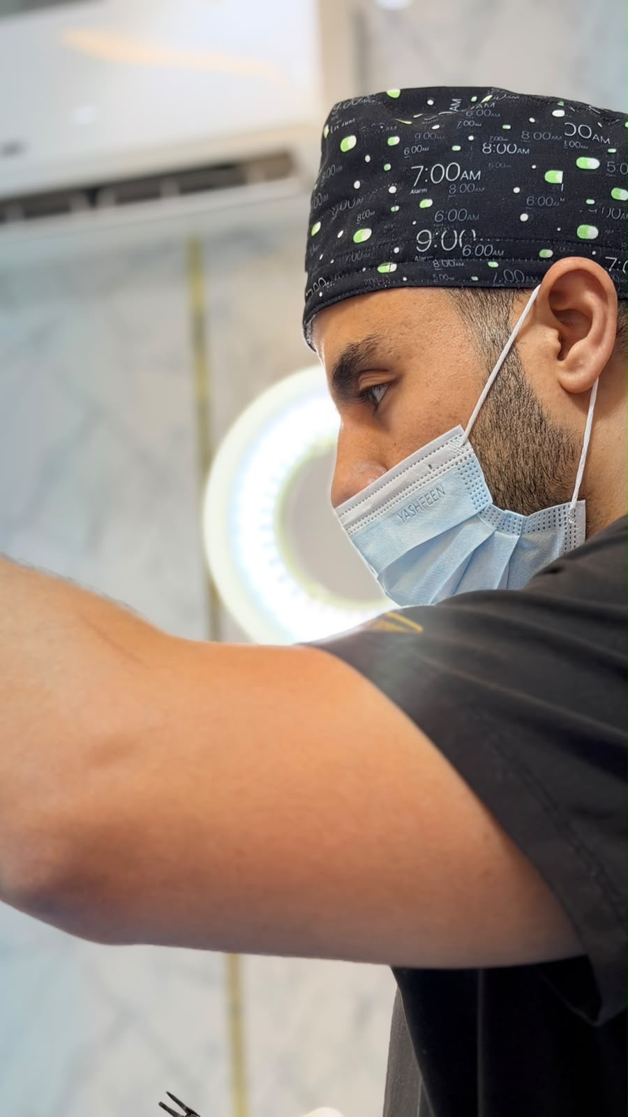 Dr. Refaat Sakr during a clinical procedure